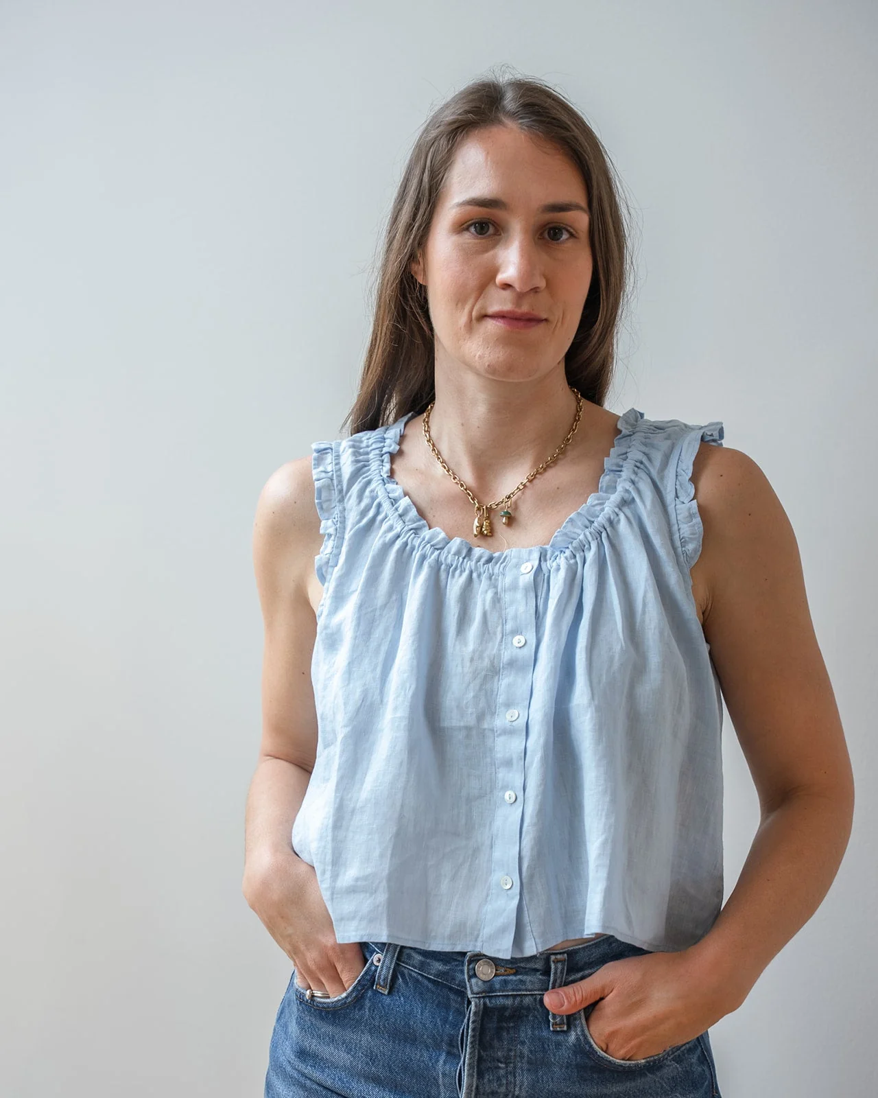 Tana Ruffle Sleeveless Top In Billow